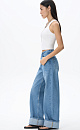 Asymmetric fastening jeans - BRUSNIKA. Women clothes