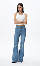 Flared jeans in the grunge style - BRUSNIKA. Women clothes