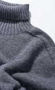 Knitted cape made of raccoon fur - BRUSNIKA. Women clothes