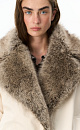 Down jacket with a fur collar - BRUSNIKA. Women clothes