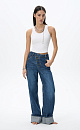 Asymmetric fastening jeans - BRUSNIKA. Women clothes