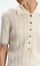 Polo with braids - BRUSNIKA. Women clothes